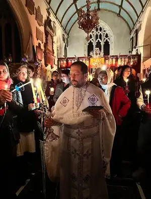 Fr Trayan with the parish community